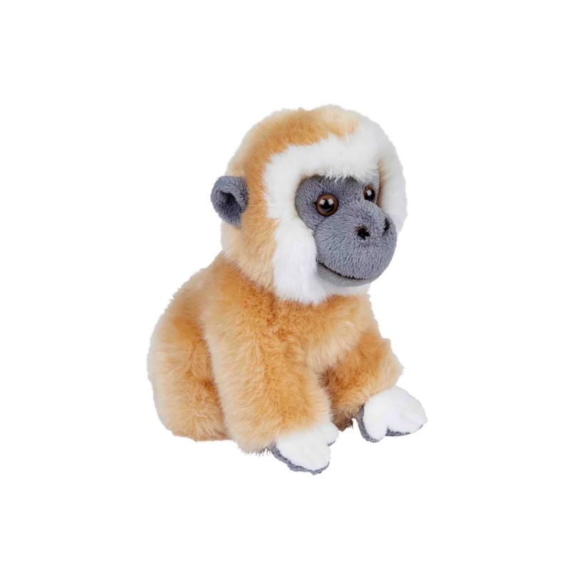 Plush gibbon monkey toy with beige fur, grey and white face on a white background