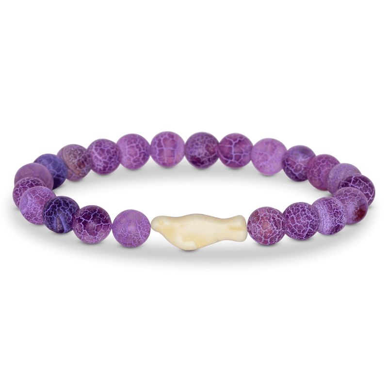 A bracelet with violet beads and a beige seal charm, designed to support conservation efforts for seals.