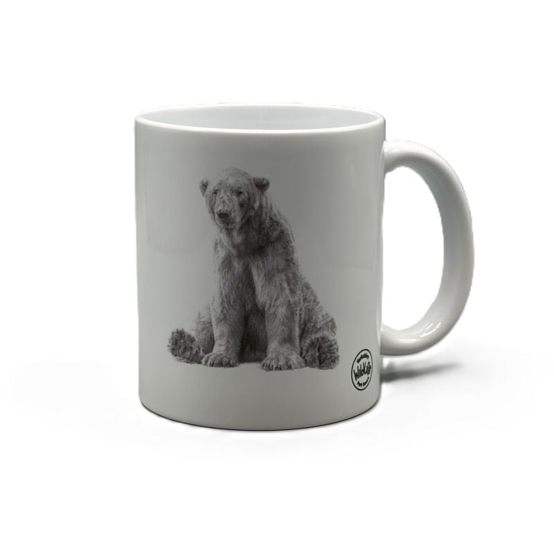A white ceramic mug featuring a black and white graphic print of Victor the polar bear sitting down, with a small circular yorkshire wildlife park logo on the lower right side of the mug, set against a plain white background.