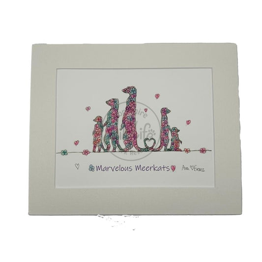 mounted artwork of a family of meerkats with floral patterns on a white background