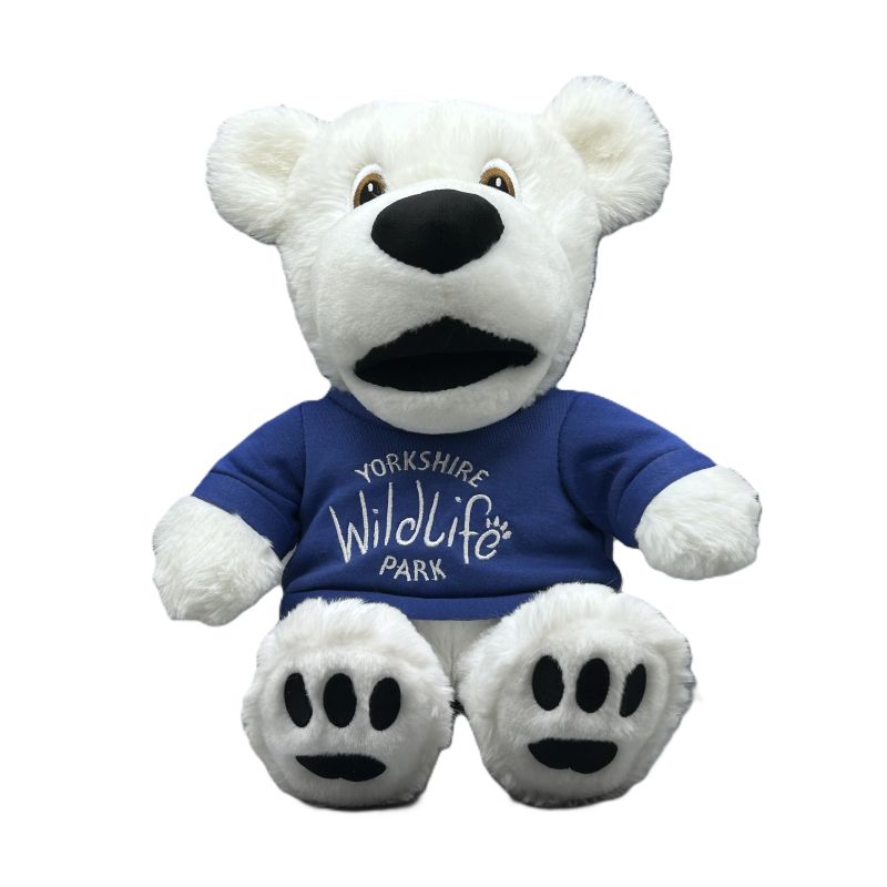 Polar bear soft toy wearing a blue shirt with 'Yorkshire Wildlife Park' text on a white background
