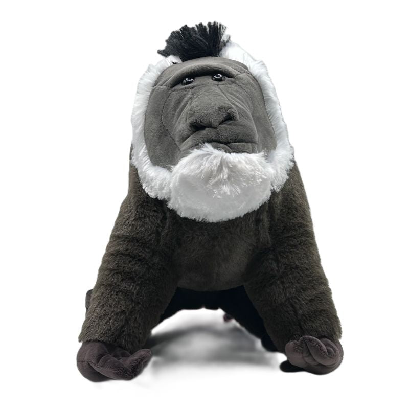 Plush toy drill baboon with a white beard on a white background