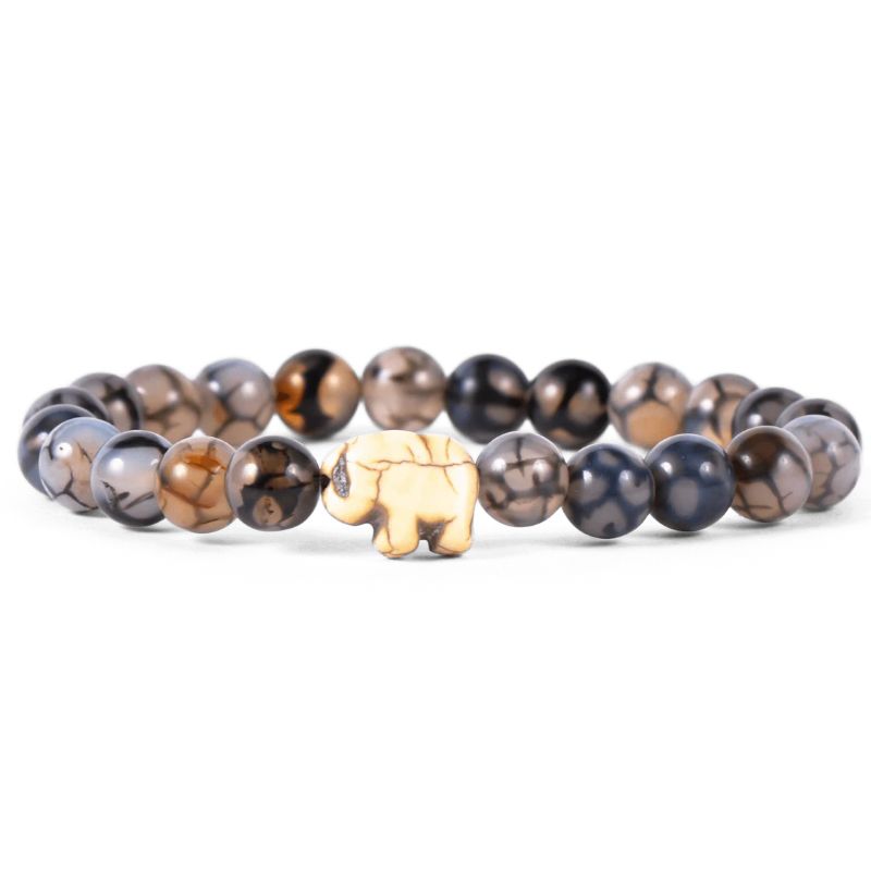 A translucent beaded bracelet with an elephant charm, branded by Fahlo