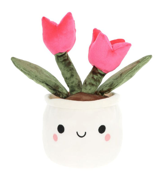 A plush toy resembling a tulip flower with a smiling face pot, predominantly white with pink petals and green leaves.