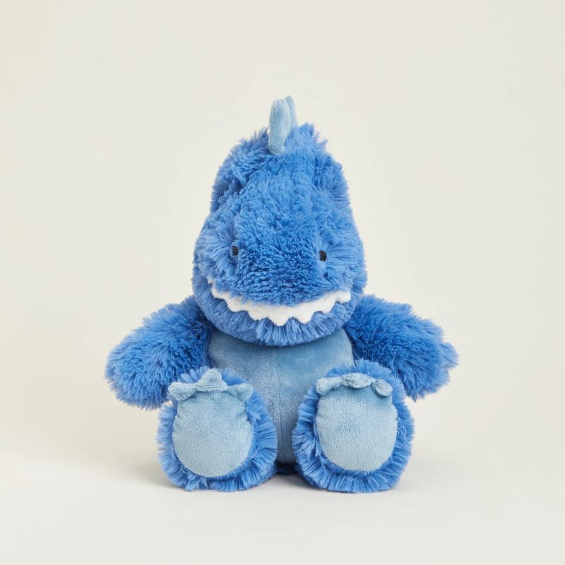 A blue plush toy resembling a T-Rex dinosaur with a soft texture, designed to be heatable in a microwave.