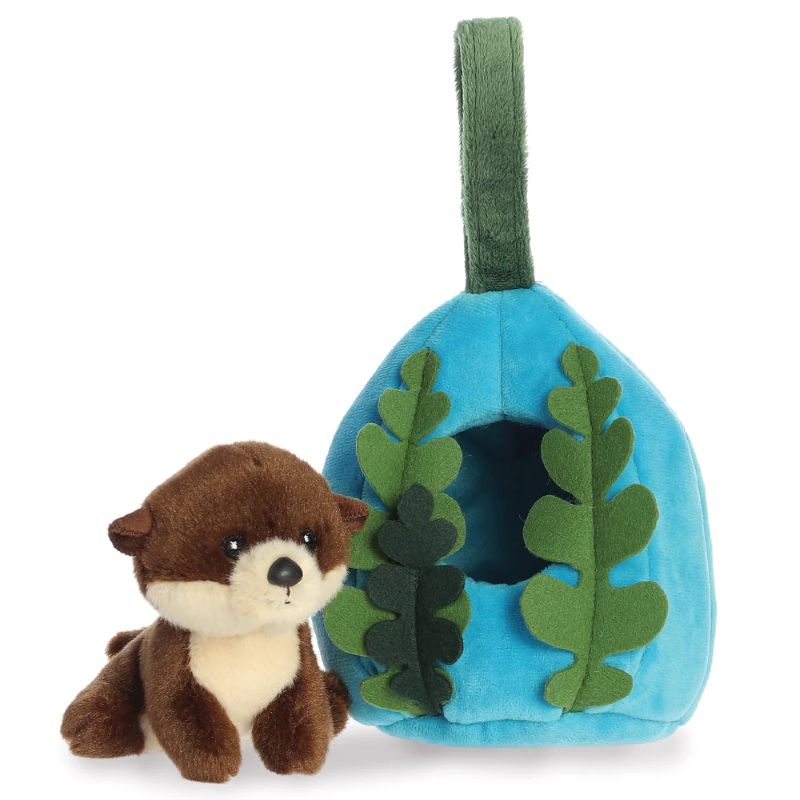 Plush toy otter with a blue hideout and green leaves on a white background