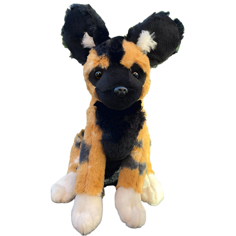 Plush toy of an African wild dog on a white background