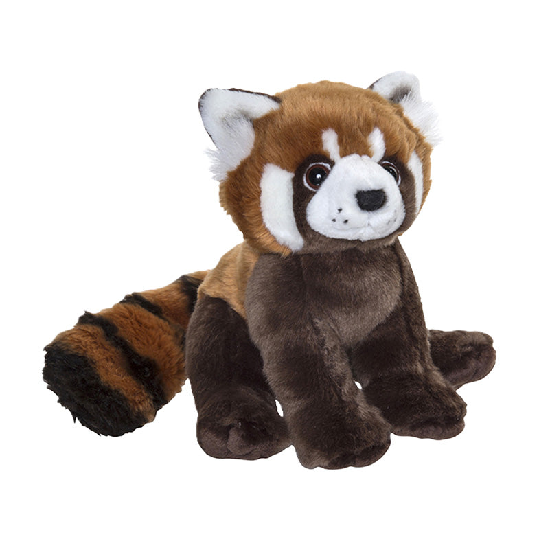 A plush red panda toy sitting on a plain white background. The stuffed animal has brown and dark brown fur, white facial markings, black eyes, and a striped tail in brown and black.