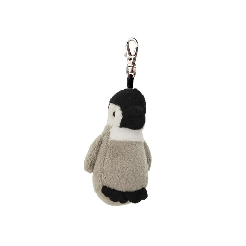 Plush penguin keychain on a white background