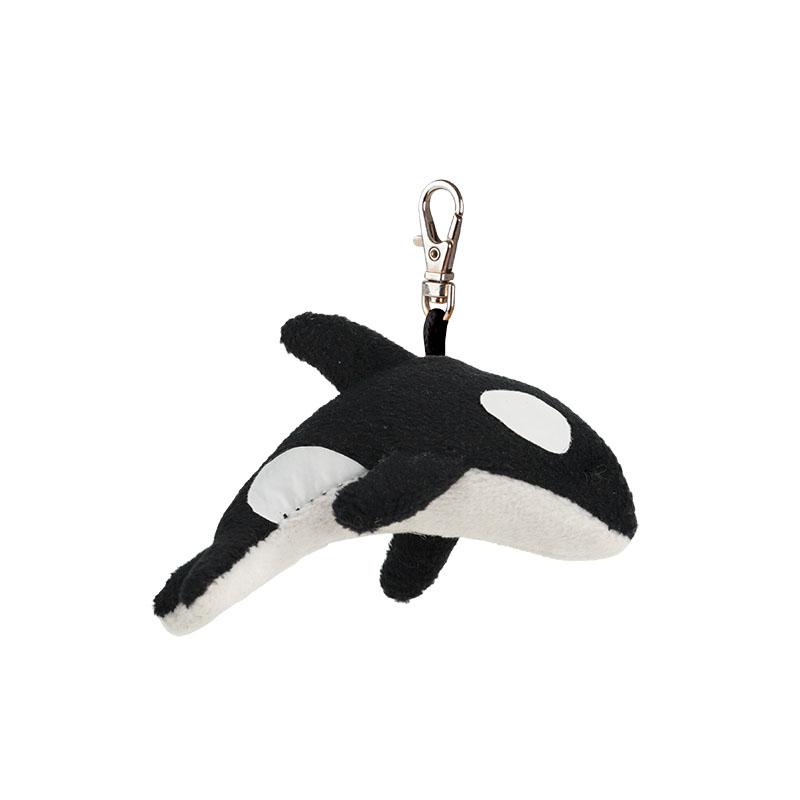Plush orca whale keychain on a white background