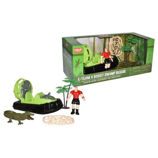 Wild Republic F-Team x Boggy Swamp Rescue toy set, including a green and black hovercraft, action figure, crocodile, palm tree, and brain piece, shown next to its retail packaging box.