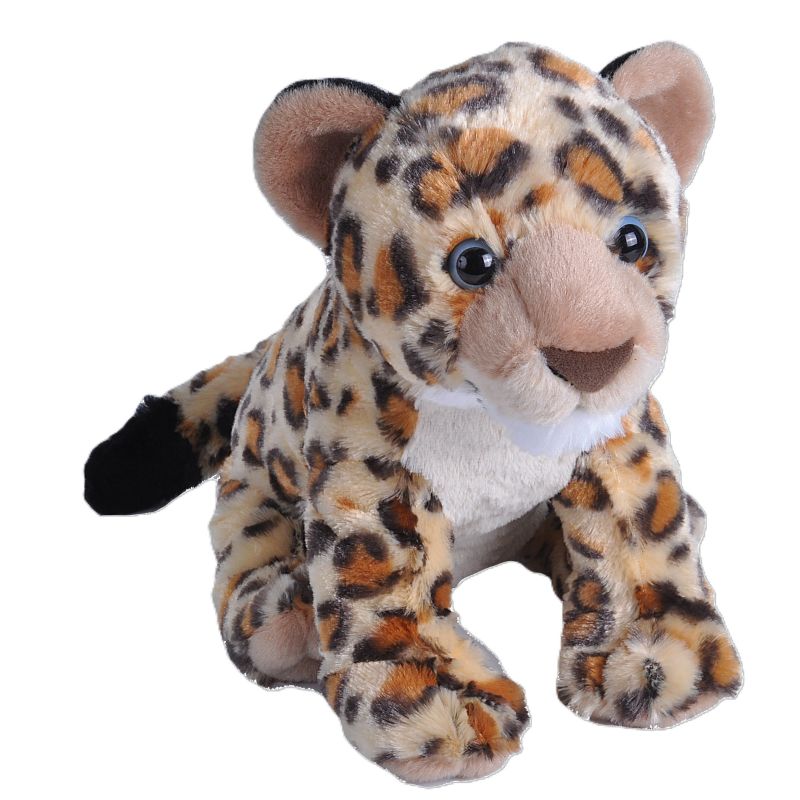 Plush toy leopard cub on a white background