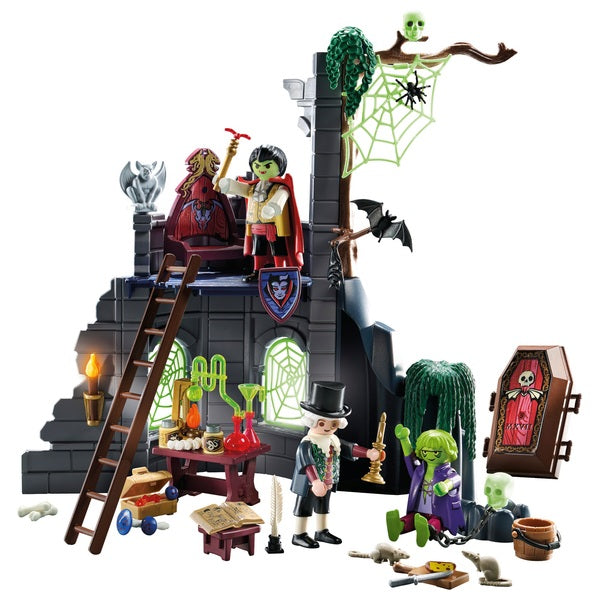 PLAYMOBIL 71651 Haunted Ruins playset featuring a castle ruin, three figures, spiders, a coffin, and various other spooky elements.