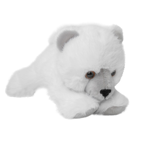Laying polar Bear soft toy on a white background