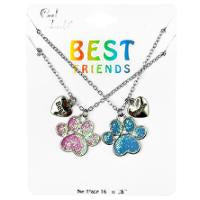 A set of two necklaces with best friends' paw prints in different colors, attached to a card that reads 'Best Friends'.