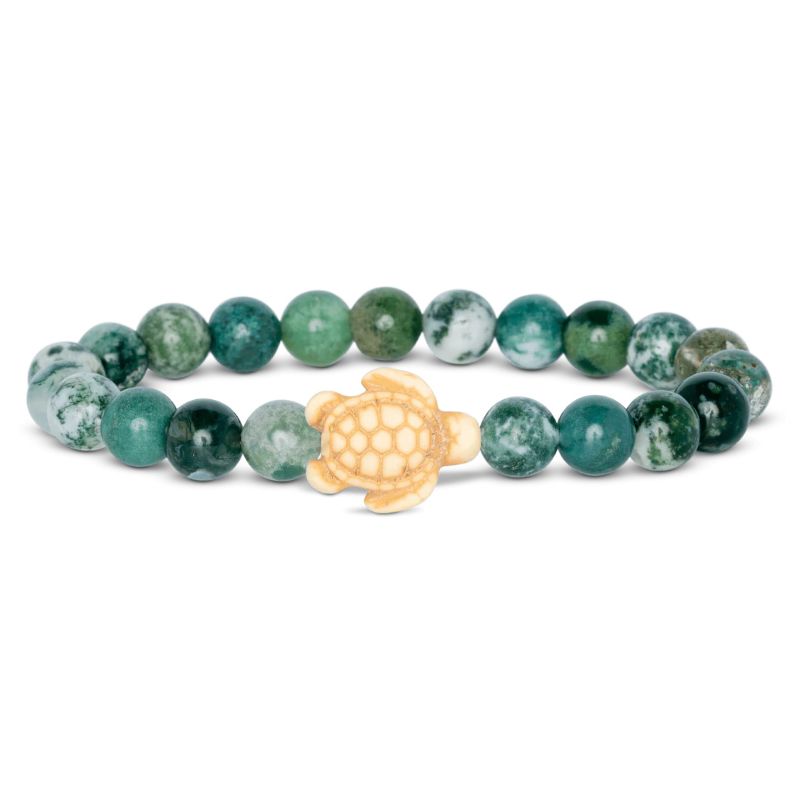 Bracelet with green beads and a beige turtle charm on a white background