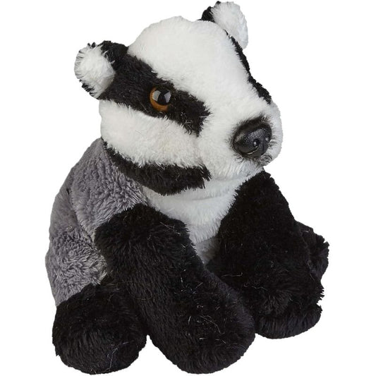 Plush toy badger on a white background