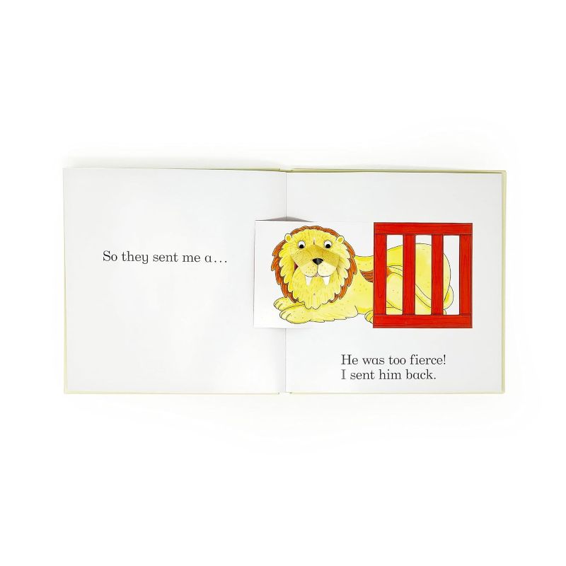 An open children's book page showing a pop-up lion in a red cage, with partial text on the left and right pages on a white background.