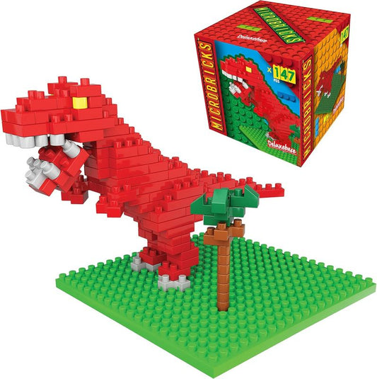 Red dinosaur model made from building blocks on a green baseplate with packaging in the background.