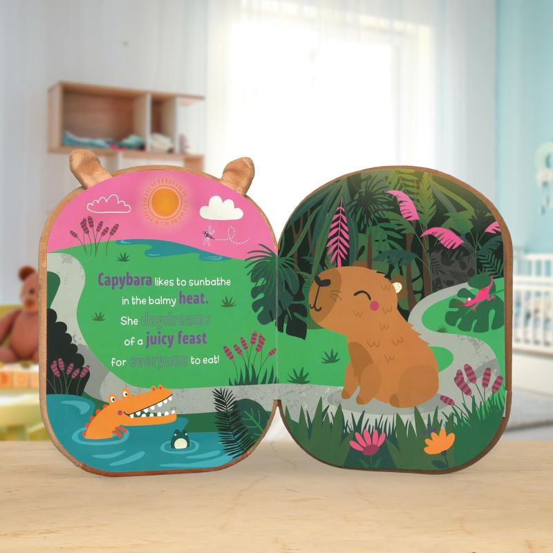 Children's book with animal illustrations on a wooden surface