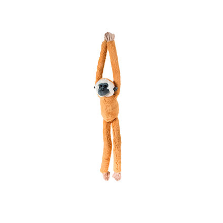 Plush gibbon monkey toy hanging on a white background