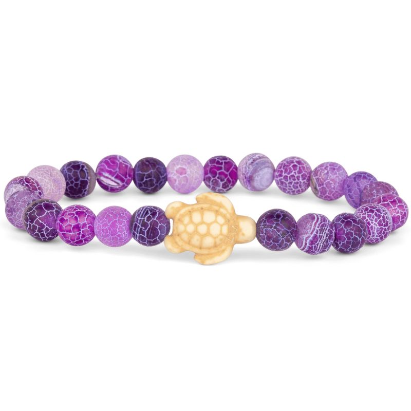 Purple beaded bracelet with a gold turtle charm on a white background