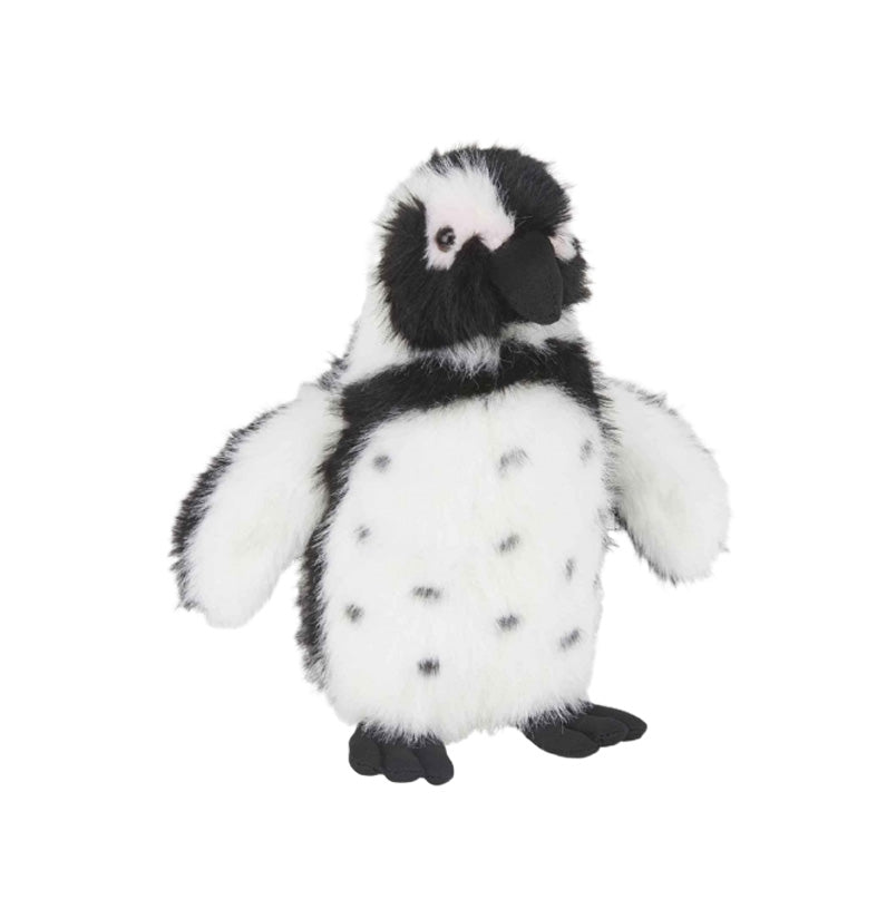 A plush penguin toy with black and white fur and spotty chest and belly, standing upright against a plain white background.
