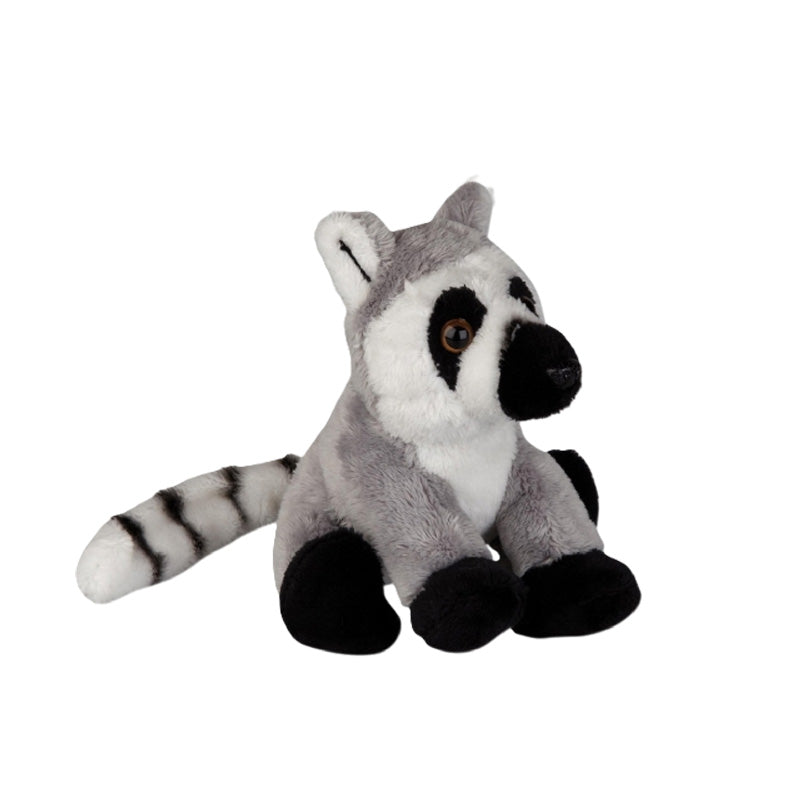 Plush toy lemur on a white background