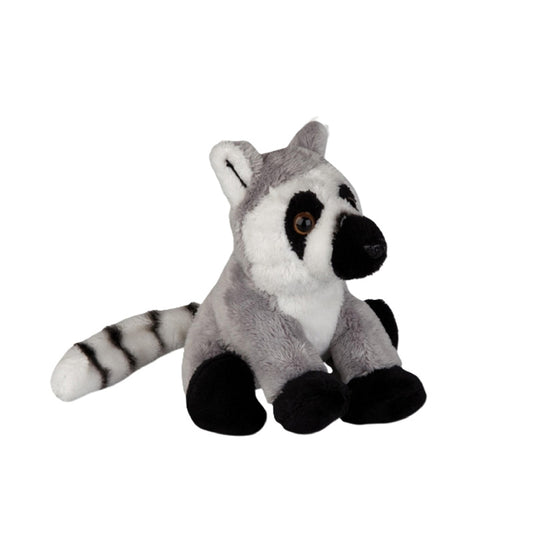Plush toy lemur on a white background