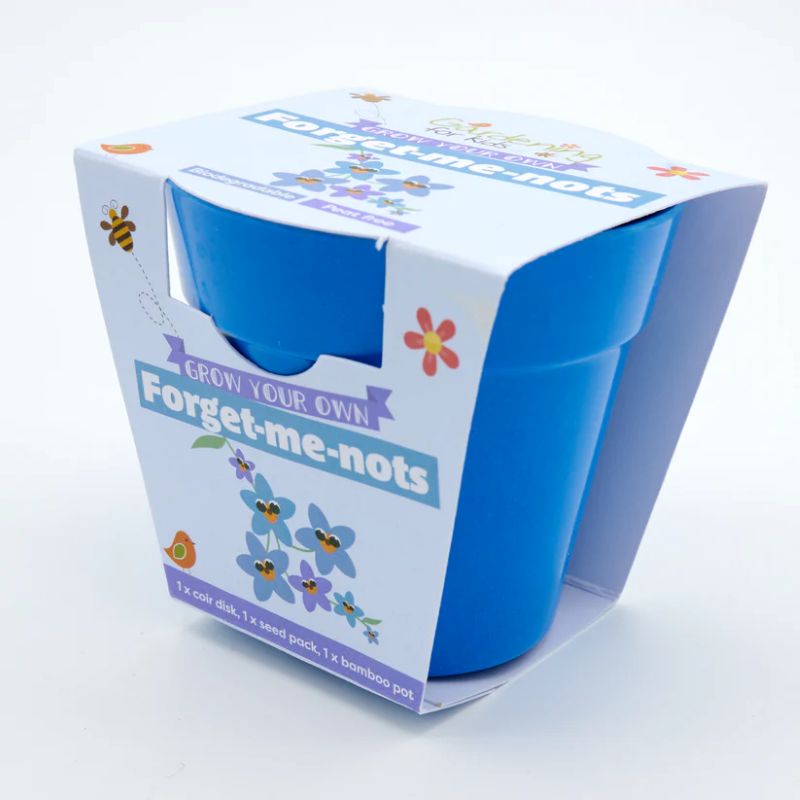 Blue container with packaging featuring 'Forget-me-nots' text on a white background