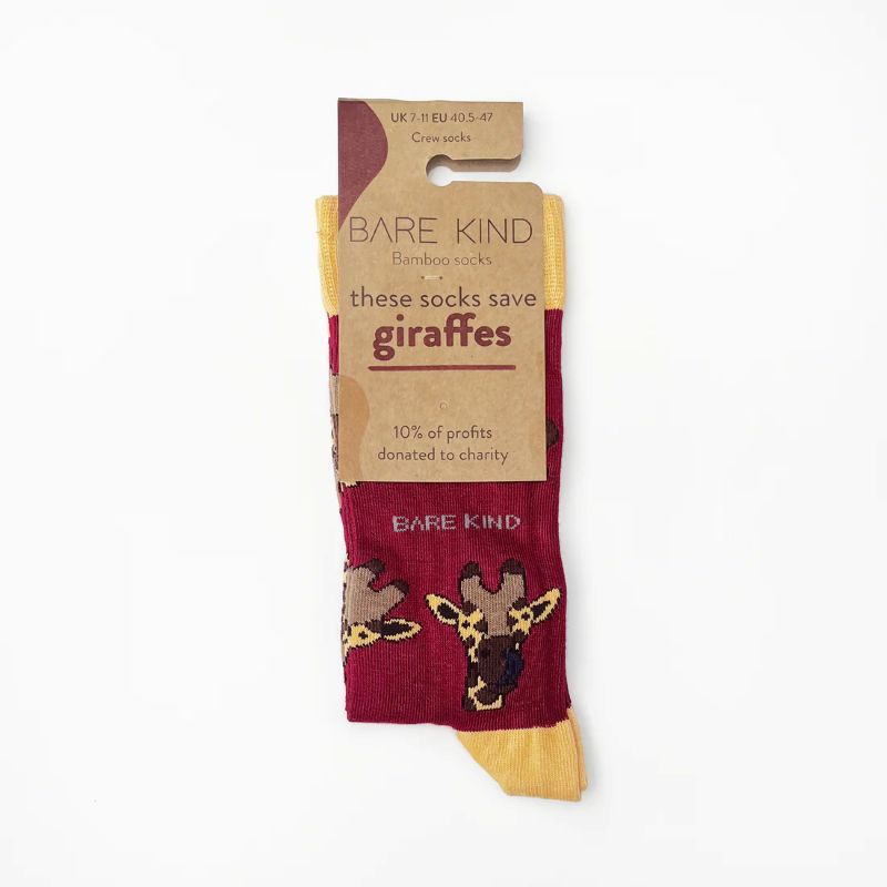 Red sock with giraffe design and 'Bare Kind' packaging on a white background