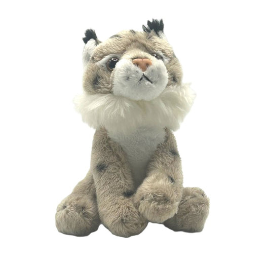 lynx small soft toy 15cm with beige and white plush and black spots on a white background