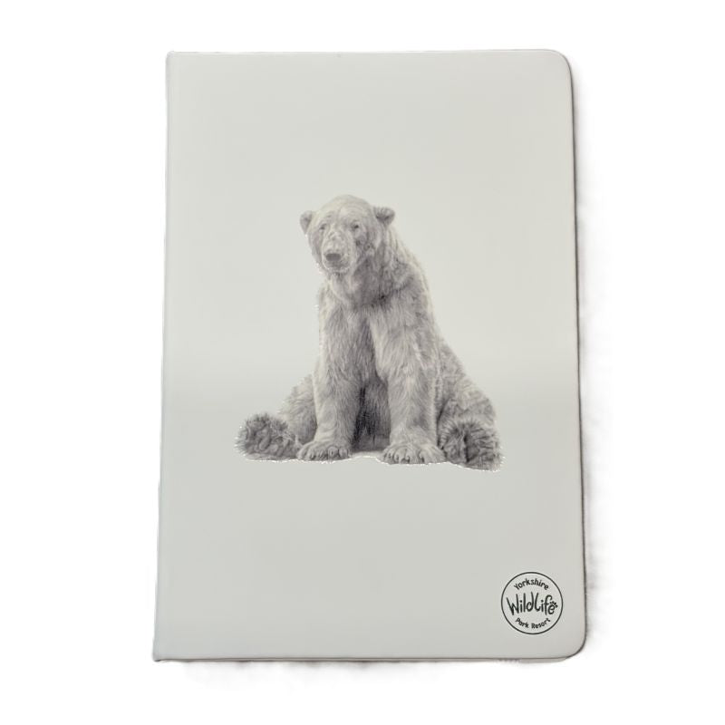 A light gray notebook with rounded corners featuring a detailed grayscale illustration of a polar bear sitting down, with a small circular Yorkshire Wildlife Park brand logo in the bottom right corner.
