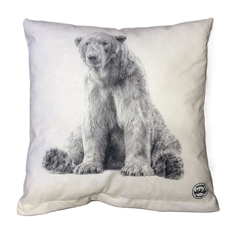 A square cushion in a white fabric featuring a detailed black and white sketch of victor the polar bear sitting down. A small circular yorkshire wildlife park logo is printed in the bottom right corner.