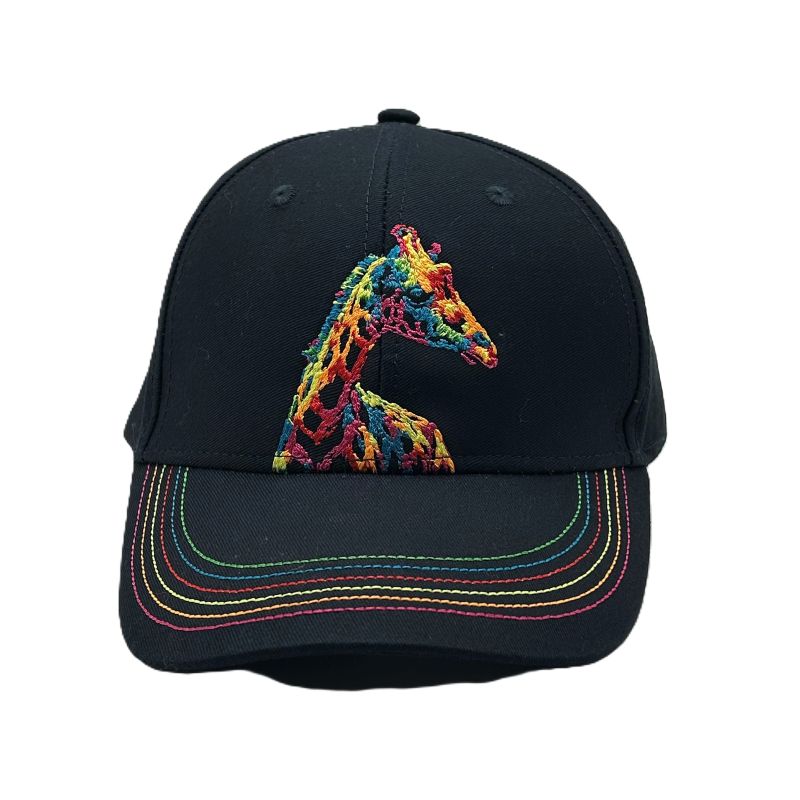 A navy baseball cap for children with a colorful embroidered giraffe design on the front and a rainbow stripe pattern around the edge.