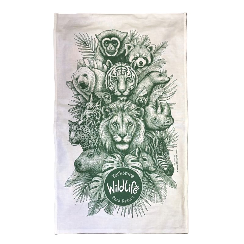 A white tea towel featuring a detailed green and white image of several animals at the yorkshire wildlife park displayed flat against a white background.