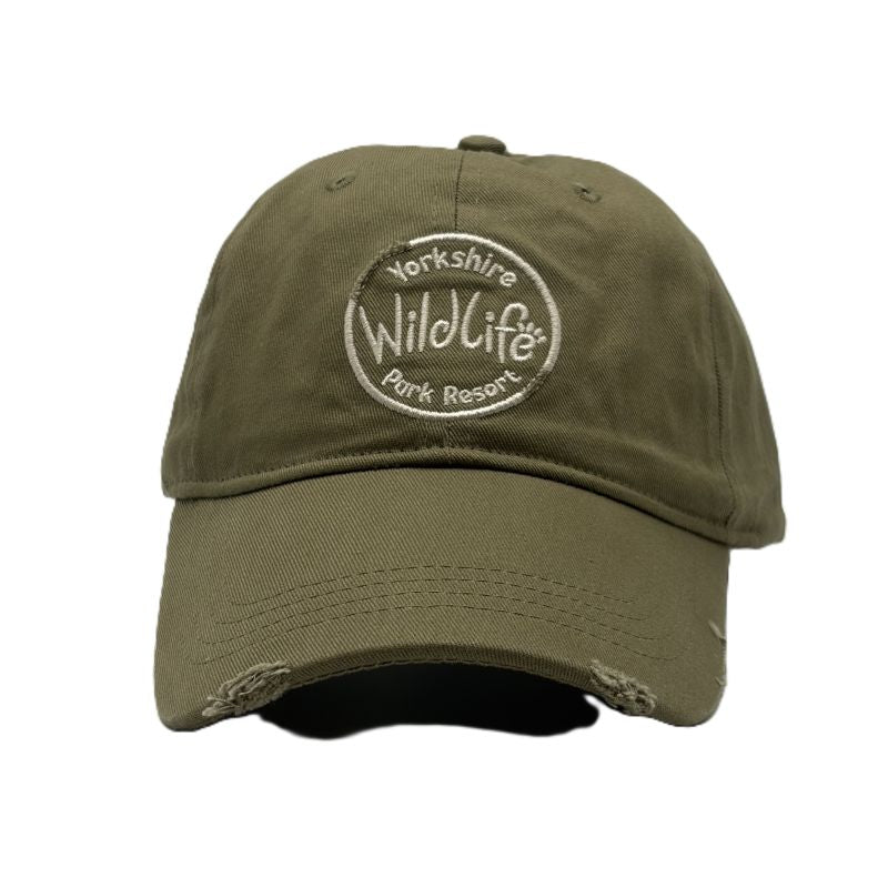 An olive green distressed baseball cap featuring a circular embroidered logo on the front that reads 'Yorkshire Wildlife Park Resort'.