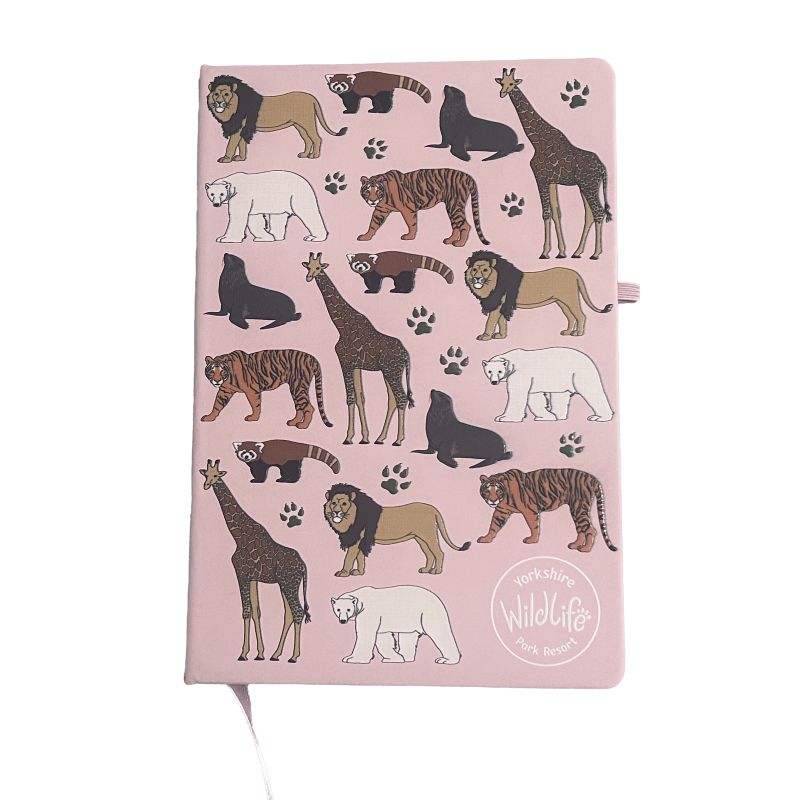 Notebook with animal illustrations on a pink background