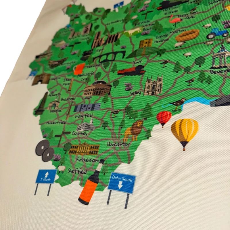 Map of England with illustrations on a fabric background