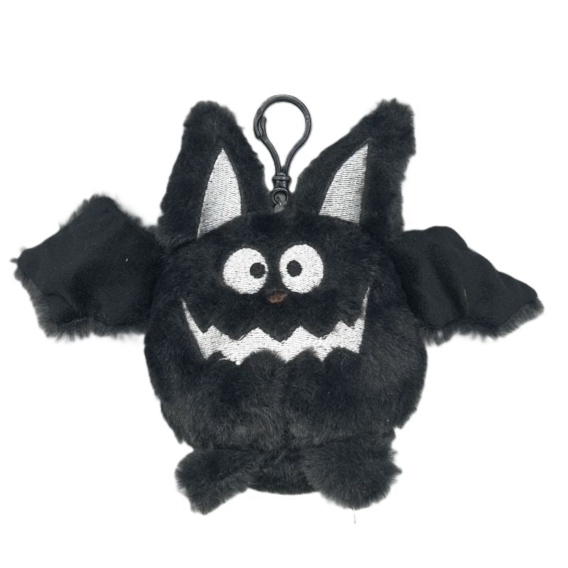 Black plush bat keychain with a white face on a white background