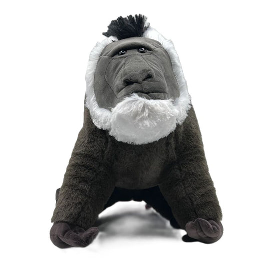 Plush toy drill baboon with a white beard on a white background