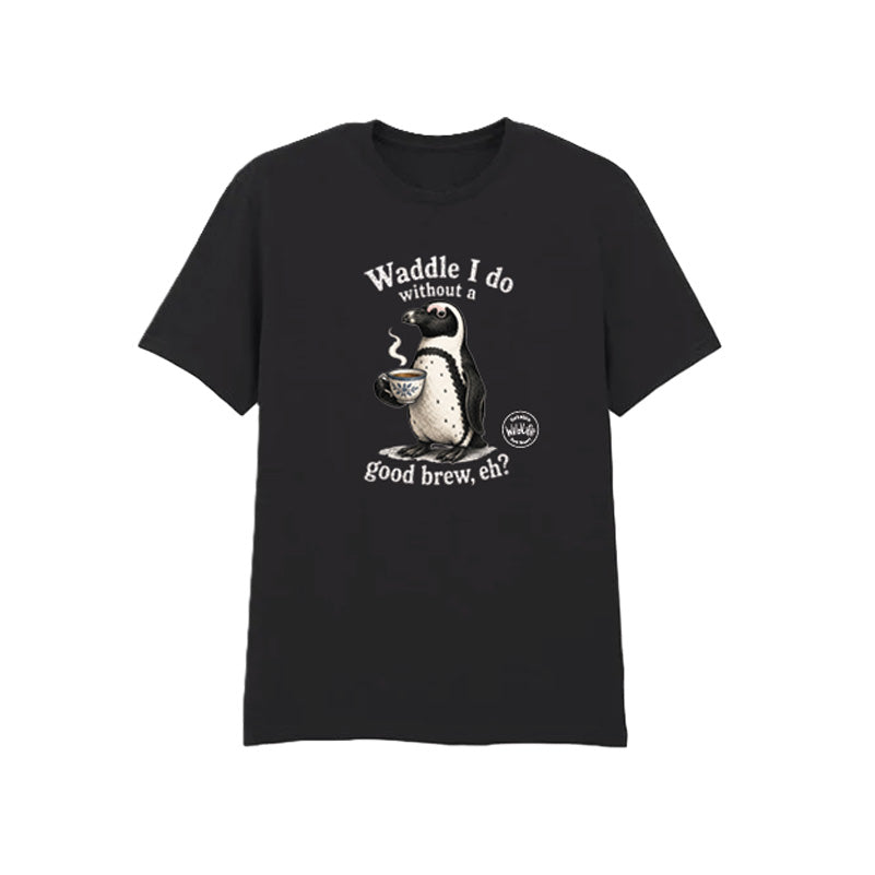 A black short-sleeve crewneck t-shirt featuring a graphic of a penguin holding a tea cup with the text 'Waddle I do without a good brew, eh?', displayed on a solid white background with yorkshire wildlife park logo