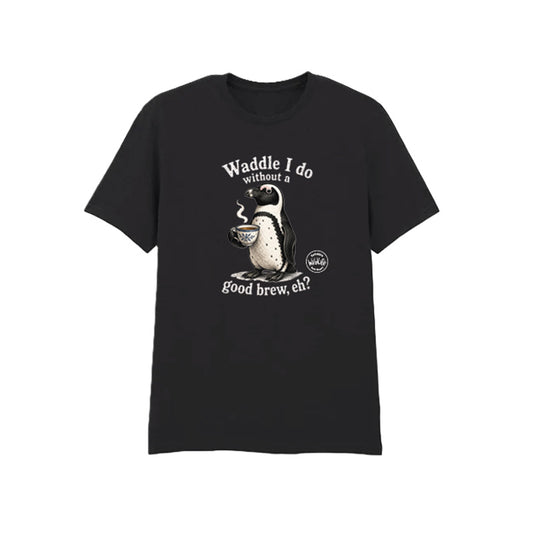 A black short-sleeve crewneck t-shirt featuring a graphic of a penguin holding a tea cup with the text 'Waddle I do without a good brew, eh?', displayed on a solid white background with yorkshire wildlife park logo