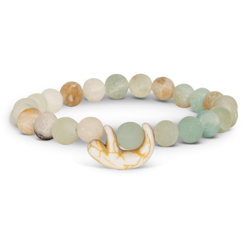 A beaded bracelet with pastel colors , featuring a beige sloth charm.
