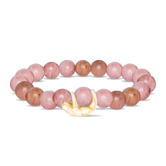 Beaded bracelet with pink beads and white charm on a white background