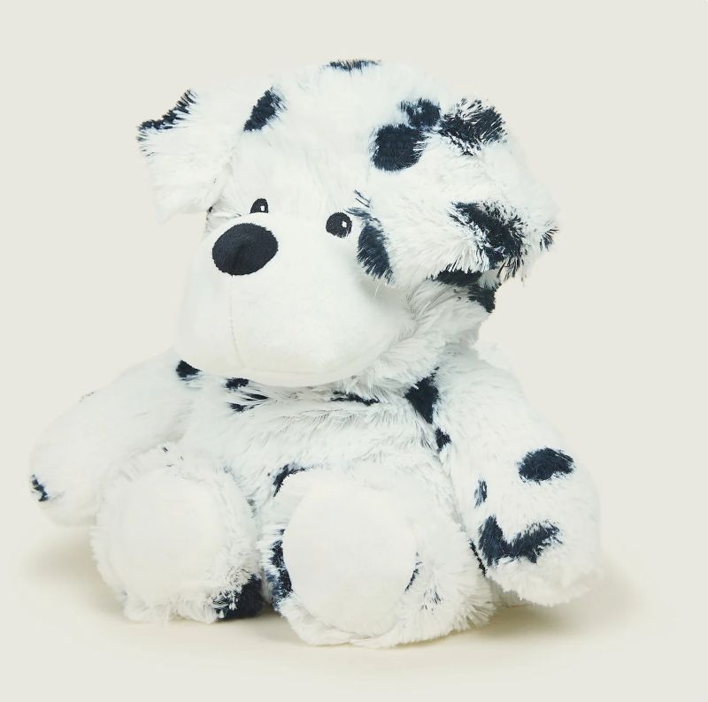 A plush Dalmatian toy with black spots on a white background, designed to be heatable and scented with lavender.