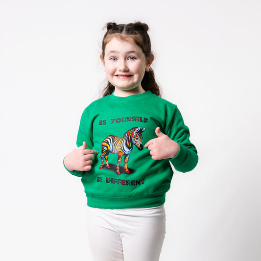 yorkshire wildlife park kids be yourself be different girl wearing green sweat shirt with rainbow coloured giraffe