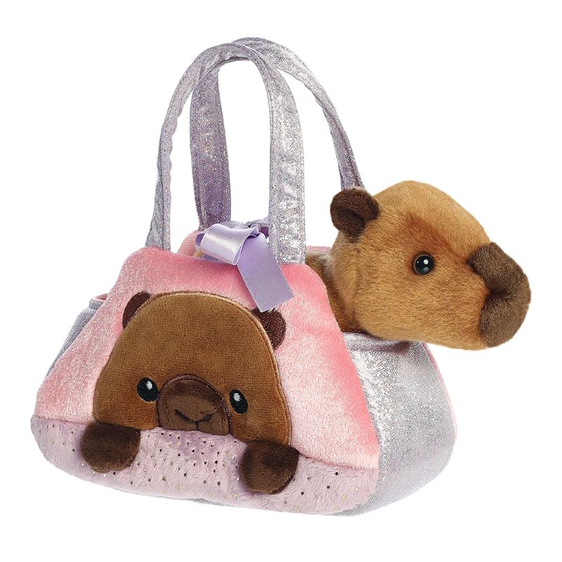 Plush toy capybara with a face on a pink and purple handbag on a white background