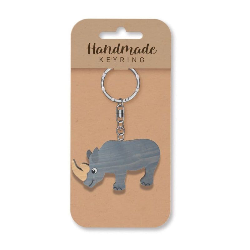 Handmade rhinoceros keyring on a brown card packaging