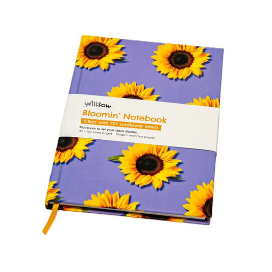 Notebook with sunflower design on a purple background